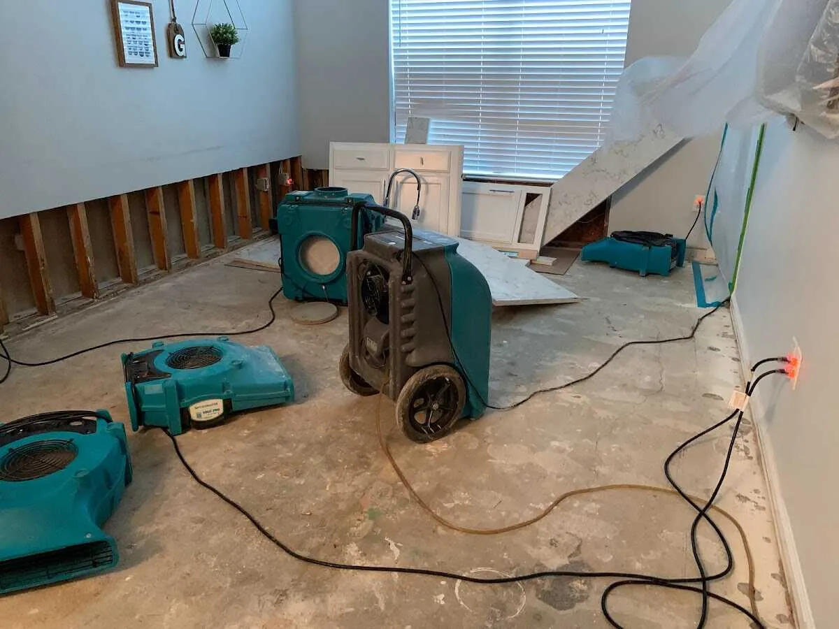 Dehumidifier in flood-cut room for Water Damage Restoration in Rupert